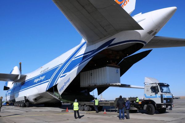 511156848749887474 (5) 24617969 - baikonur, kazakhstan - november 11, 2013. russian volga-dnepr antonov an-124 long-range heavy transport plane is being unloaded in yubileiny airport.
